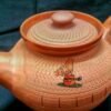 Terracotta tea pot